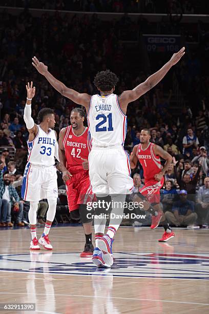 Joel Embiid of the Philadelphia 76ers celebrates a three point basket basket durig the game against the Houston Rockets at Wells Fargo Center on...