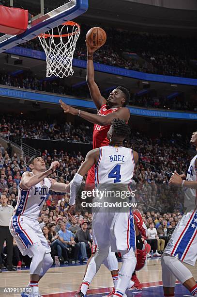 Clint Capela of the Houston Rockets drives to the basket and dunks the ball against the Philadelphia 76ers at Wells Fargo Center on January 27, 2017...