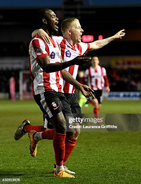 Theo Robinson of Lincoln Citycelebrates scoring his side's third goal during the Emirates FA Cup Fourth Round match between Lincoln City and Brighton...