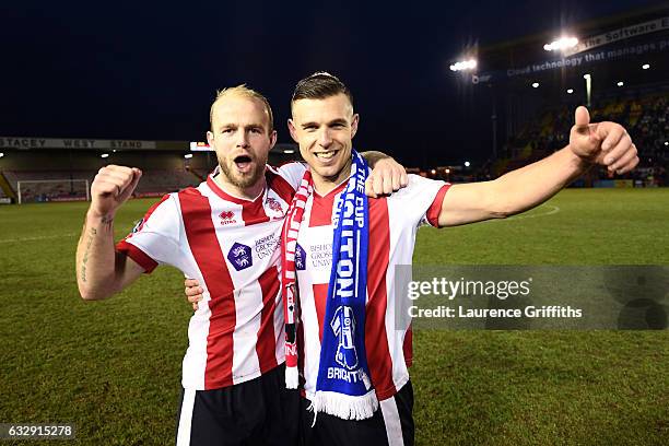 Bradley Wood and Jack Muldoon of Lincoln City celebrate their 3-0 win after the Emirates FA Cup Fourth Round match between Lincoln City and Brighton...