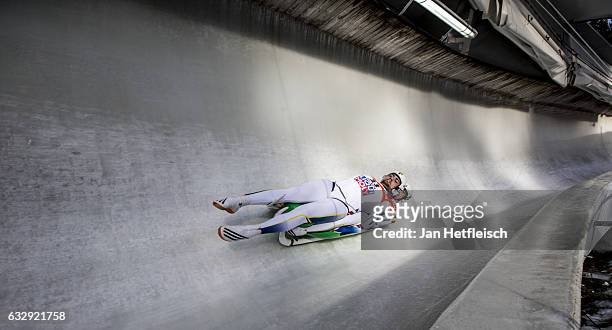 Angel Kozak and Marian Tudor of Romania compete in the first heat of the Men's Double Luge competition during the second day of the FILWorld...