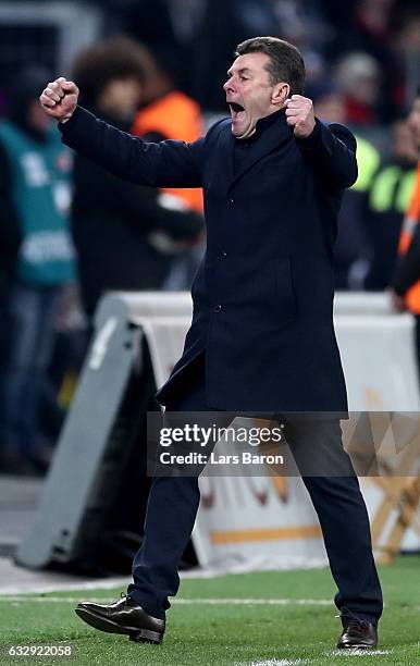 Head coach Dieter Hecking of Moenchengladbach celebrates after winning the Bundesliga match between Bayer 04 Leverkusen and Borussia Moenchengladbach...