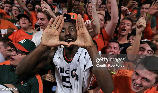 Davon Reed of the Miami Hurricanes celebrates with fans after the game against the North Carolina Tar Heels at the Watsco Center on January 28, 2017...