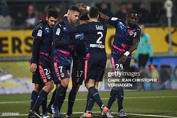 Bordeaux's players celebrate after a goal of Nancy's French defender Joffrey Cuffaut during the French L1 football match between Nancy and Bordeaux...