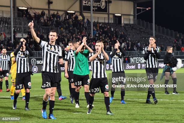 Angers' French midfielder Pierrick Capelle, Angers' French defender Romain Thomas, Angers' French midfielder Flavien Tait, Angers' French defender...