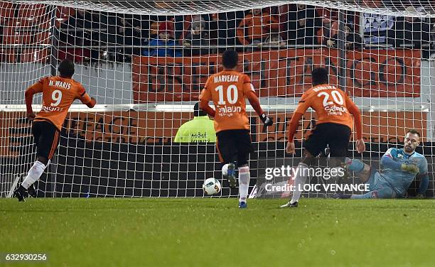 Lorient's Ghanaian forward Abdul Majeed Waris scores a penalty kick during the French L1 football match between Lorient and Dijon on January 28, 2017...