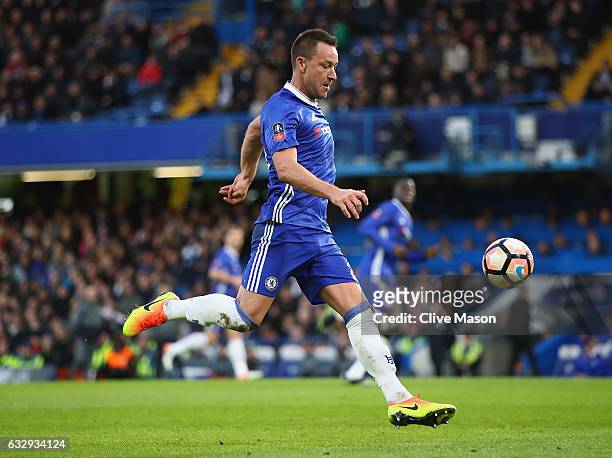 John Terry of Chelsea in action during the Emirates FA Cup fourth round match between Chelsea and Brentford at Stamford Bridge on January 28, 2017 in...