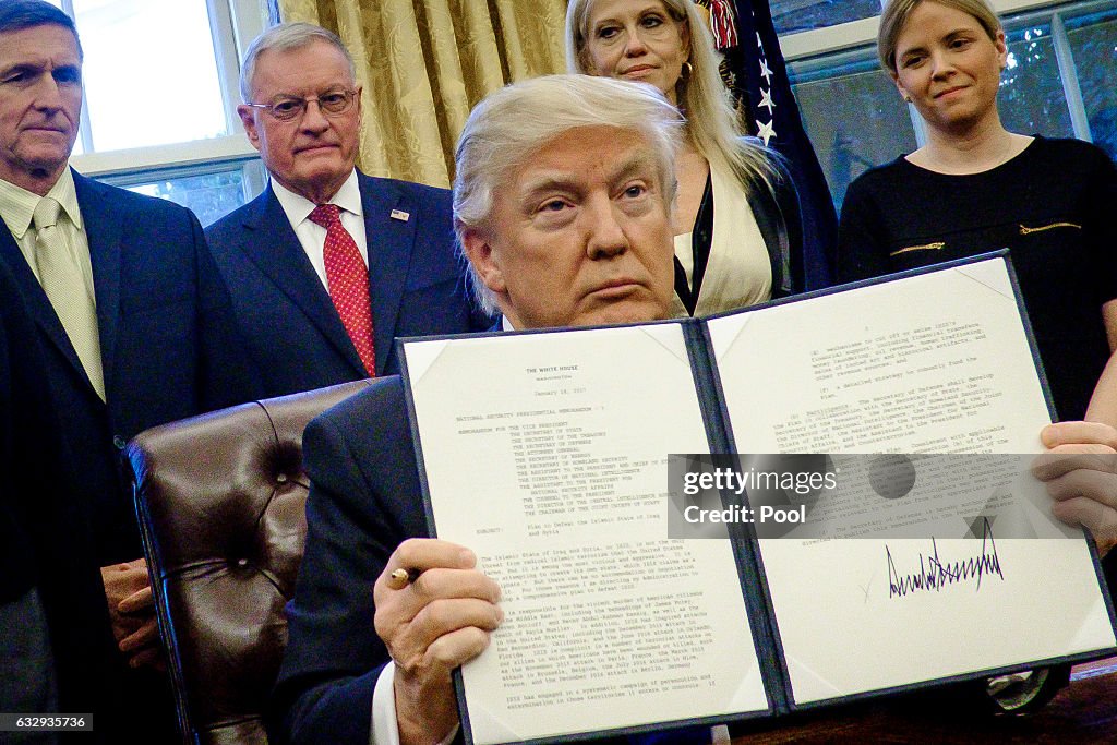 President Trump Signs Executive Orders In The Oval Office