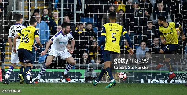 Kane Hemmings of Oxford United scores his sides first goal during the Emirates FA Cup Fourth Round match between Oxford United and Newcastle United...