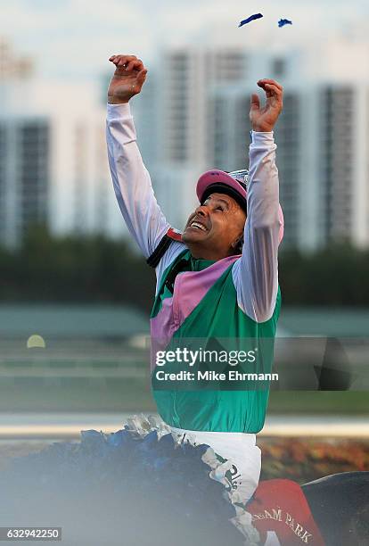 Mike Smith atop Arrogate celebrates after winning the $12 Million Pegasus World Cup Invitational at Gulfstream Park on January 28, 2017 in...