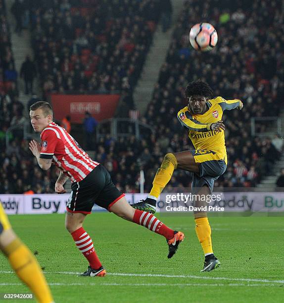 Ainsley Maitland-Niles of Arsenal shoots under pressure rom Jordy Clasie of Southampton during the match between Southampton and Arsenal at St Mary's...