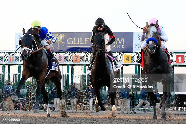 Mike Smith atop Arrogate breaks the gate on their way to winning the $12 Million Pegasus World Cup Invitational at Gulfstream Park on January 28,...