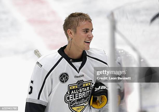 Musician Justin Bieber reacts during the 2017 NHL All-Star Celebrity Shootout as part of the 2017 NHL All-Star Weekend at STAPLES Center on January...