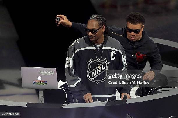 Rapper Snoop Dogg performs prior to the 2017 Coors Light NHL All-Star Skills Competition as part of the 2017 NHL All-Star Weekend at STAPLES Center...