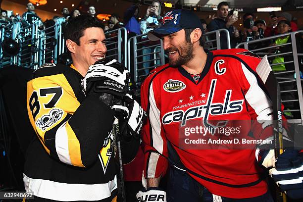 Sidney Crosby of the Pittsburgh Penguins and Alex Ovechkin of the Washington Capitals share a laugh before taking the ice for the 2017 Coors Light...