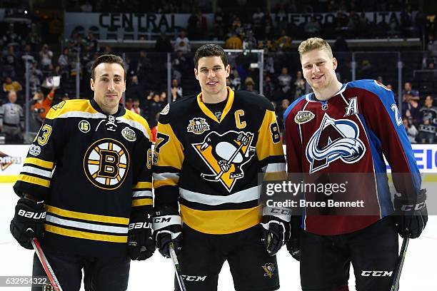 Brad Marchand of the Boston Bruins, Sidney Crosby of the Pittsburgh Penguins and Nathan MacKinnon of the Colorado Avalanche poses for a photo after...