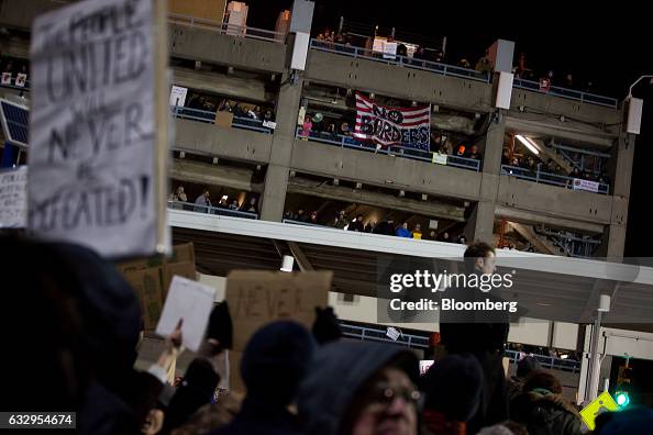 Demonstrators Protest At JFK Airport As White House Defends Immigrant Ban Demonstrators Protest At JFK Airport As White House Defends Immigrant Ban