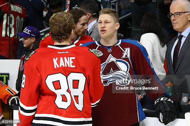 Patrick Kane of the Chicago Blackhawks and Nathan MacKinnon of the Colorado Avalanche converse during the Bridgestone NHL Fastest Skater event during...
