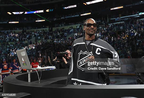 Rapper Snoop Dogg spins music as he introduces the start of the 2017 Coors Light NHL All-Star Skills Competition at Staples Center on January 28,...