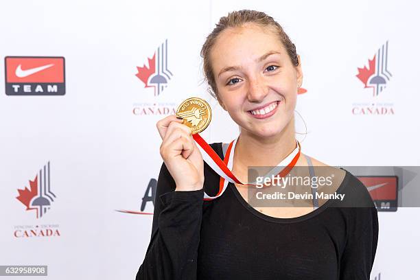 Ariane Bilodeau holds up her gold medal in the Senior Women's Foil event on January 28, 2017 at the Canada Cup Fencing Competition at the Richmond...