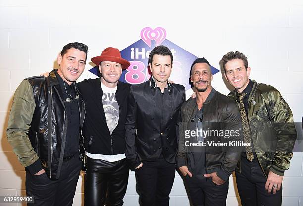 Singers Jonathan Knight, Donnie Wahlberg, Jordan Knight, Danny Wood and Joey McIntyre of New Kids On The Block attend the iHeart80s Party 2017 at SAP...