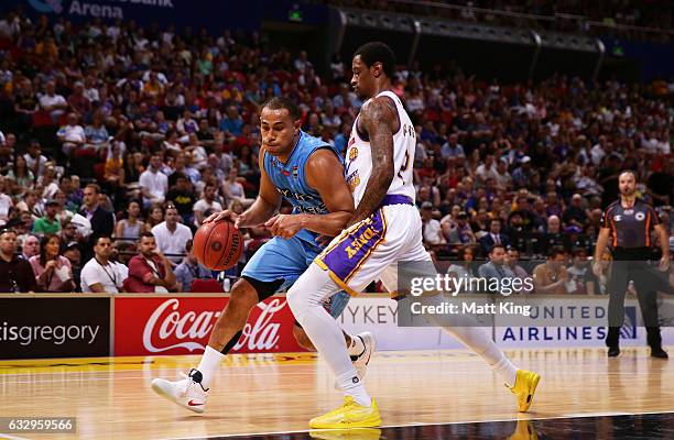 Greg Whittington of the Kings defends against Mika Vukona of the Breakers during the round 17 NBL match between the Sydney Kings and the New Zealand...