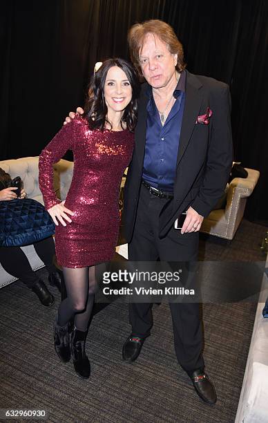 Host Martha Quinn and musician Eddie Money attend the iHeart80s Party 2017 at SAP Center on January 28, 2017 in San Jose, California.