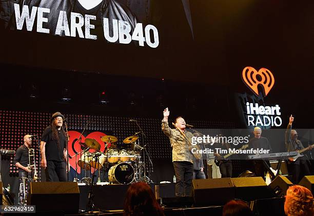 Musicians Astro, Ali Campbell and Mickey Virtue of UB40 perform on stage during the iHeart80s Party 2017 at SAP Center on January 28, 2017 in San...