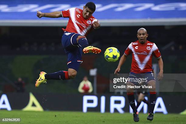 Martin Bravo of Veracruz hits the ball during the 4th round match between America and Veracruz as part of the Torneo Clausura 2017 Liga MX at Azteca...