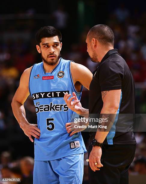 Breakers coach Paul Henare talks to Shea Ili of the Breakers during the round 17 NBL match between the Sydney Kings and the New Zealand Breakers at...