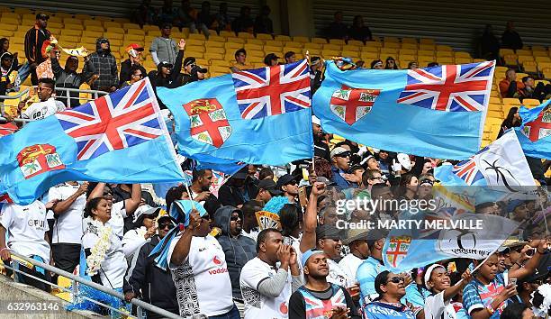 Fiji fans cheer during the cup half final between Fiji and Scotland day two of the IRB rugby Sevens at Westpac Stadium in Wellington on January 29,...