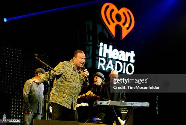 Musicians Ali Campbell, Astro and Mickey Virtue of UB40 perform on stage during the iHeart80s Party 2017 at SAP Center on January 28, 2017 in San...