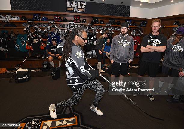 Rapper Snoop Dogg visits the locker room before the start of the 2017 Coors Light NHL All-Star Skills Competition at Staples Center on January 28,...