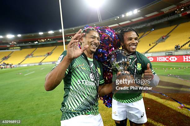 Justin Geduld and Rosko Specman of South Africa celebrate following the gold medal final match between Fiji and South Africa during the 2017...