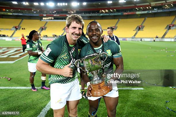 Kwagga Smith and Siviwe Soyizwapi of South Africa celebrate following the gold medal final match between Fiji and South Africa during the 2017...