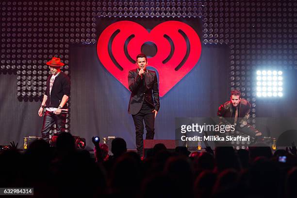 Vocalists Donnie Wahlberg , Jordan Knight and Joey McIntyre of NKOTB perform on stage at 2017 iHeart80s Party at SAP Center on January 28, 2017 in...