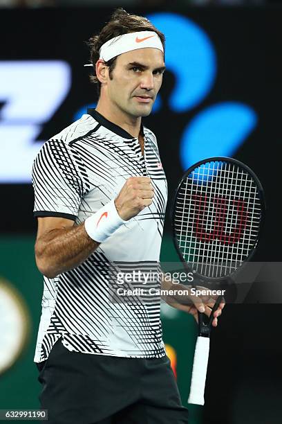 Roger Federer of Switzerland celebrates winning a game in his Men's Final match against Rafael Nadal of Spain on day 14 of the 2017 Australian Open...