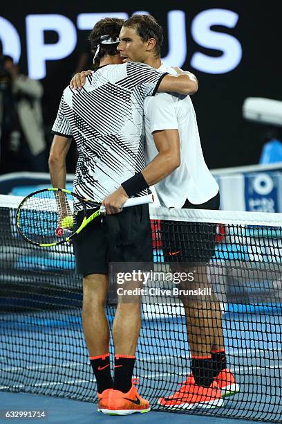 Roger Federer of Switzerland is congratulated by Rafael Nadal of Spain after winning their Men's Final match against on day 14 of the 2017 Australian...