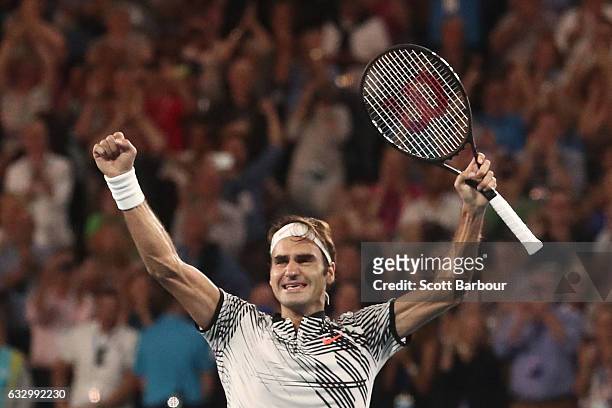 Roger Federer of Switzerland celebrates championship point in his Men's Final match against Rafael Nadal of Spain on day 14 of the 2017 Australian...