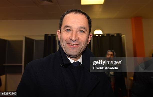 French former education minister and candidate for the left-wing primaries Benoit Hamon speaks to media after casting his ballot during the second...