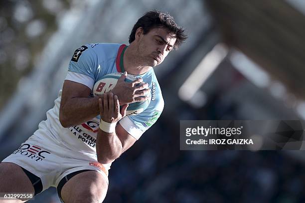 Bayonne's Argentinan fullback Martin Bustos Moyano grabs the ball during the French Top 14 rugby union match between Aviron Bayonnais and CA Brive...