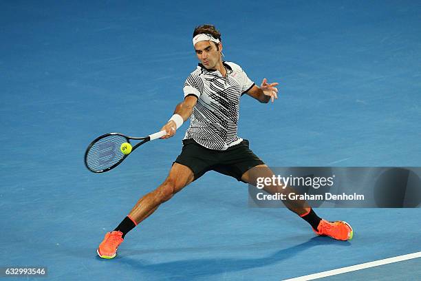 Roger Federer of Switzerland plays a forehand in his Men's Final match against Rafael Nadal of Spain on day 14 of the 2017 Australian Open at...