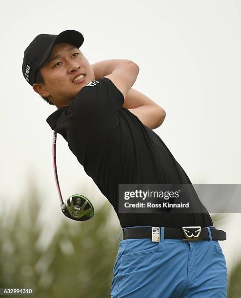 Jeunghun Wang of South Korea hits his tee shot on the 16th hole during the fourth round of the Commercial Bank Qatar Masters at the Doha Golf Club on...