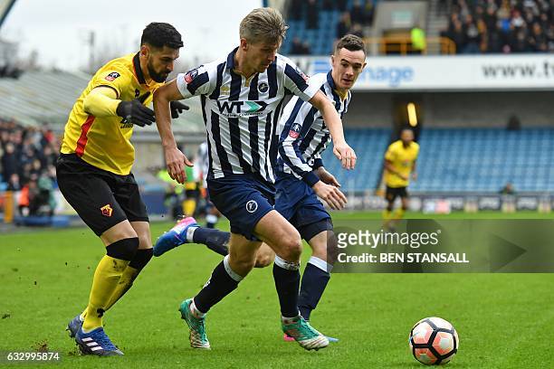 Millwall's English-born Welsh striker Steve Morison runs with the ball during the English FA Cup fourth round football match between Millwall and...