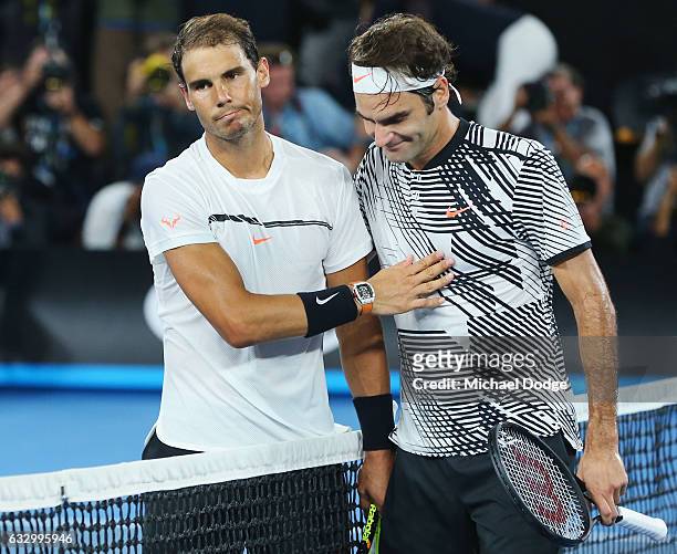 Roger Federer of Switzerland celebrates winning in the Men's Final match against Raphael Nadal of Spain on day 14 of the 2017 Australian Open at...