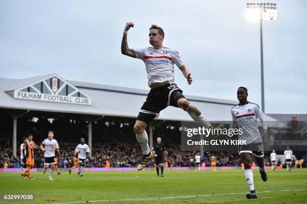 Fulham's Norwegian midfielder Stefan Johansen celebrates scoring their fourth goal during the English FA Cup fourth round football match between...