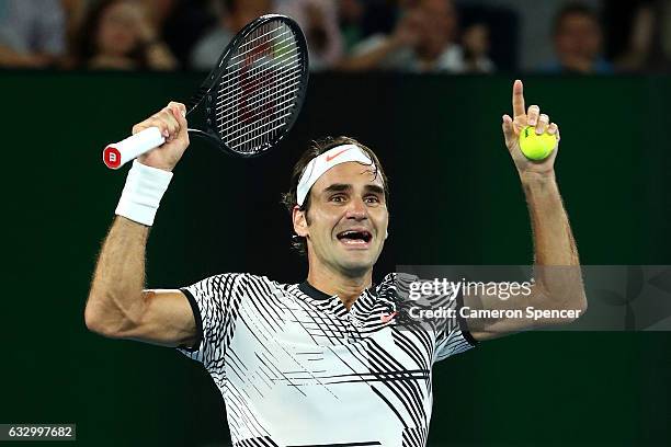 Roger Federer of Switzerland celebrates winning championship point in his Men's Final match against Rafael Nadal of Spain on day 14 of the 2017...