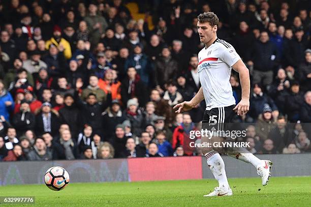 Fulham's English striker Chris Martin scores their second goal during the English FA Cup fourth round football match between Fulham and Hull City at...