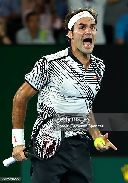 Roger Federer of Switzerland celebrates winning championship point in his Men's Final match against Rafael Nadal of Spain on day 14 of the 2017...