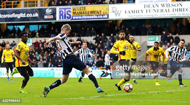 Steve Morison of Millwall scores his sides first goal during The Emirates FA Cup Fourth Round match between Millwall and Watford at The Den on...